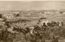 [Bitwa pod Racławicami : Strzelcy polscy wtłaczają huzarów woroneżskich i jaszczyki rosyjskie do parowu]